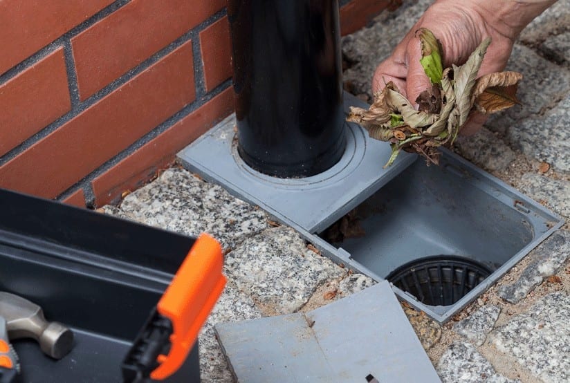 What causes blocked drains?